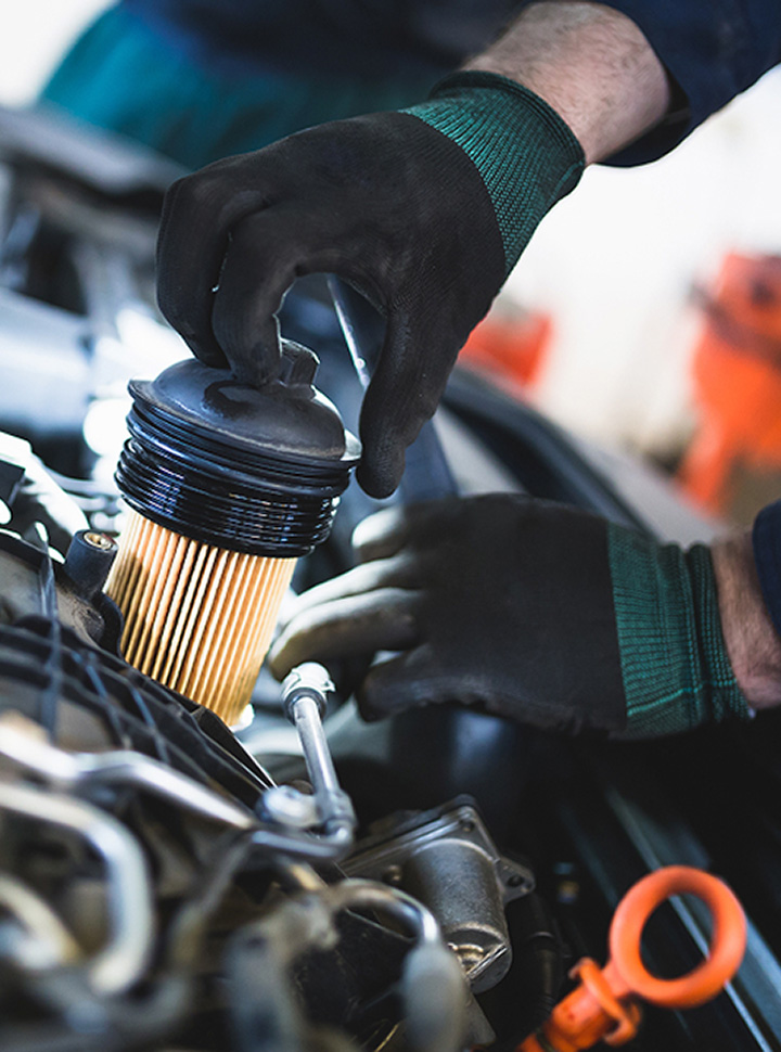 Mechanic working on vehicle