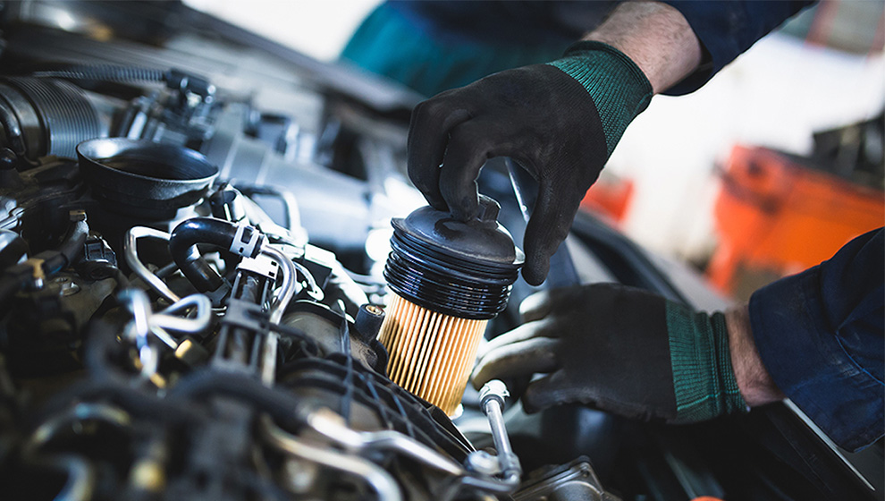 Mechanic working on vehicle